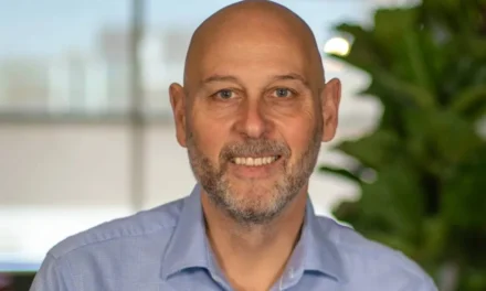 As income nears £1 billion, OCU main Hughes points to global markets.